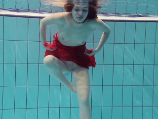Red Dressed Teen Swimming With Her Eyes Opened free video